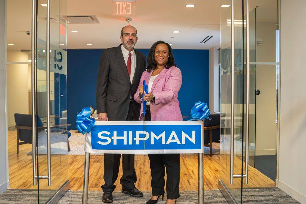 photo of ribbon cutting at new Stamford office